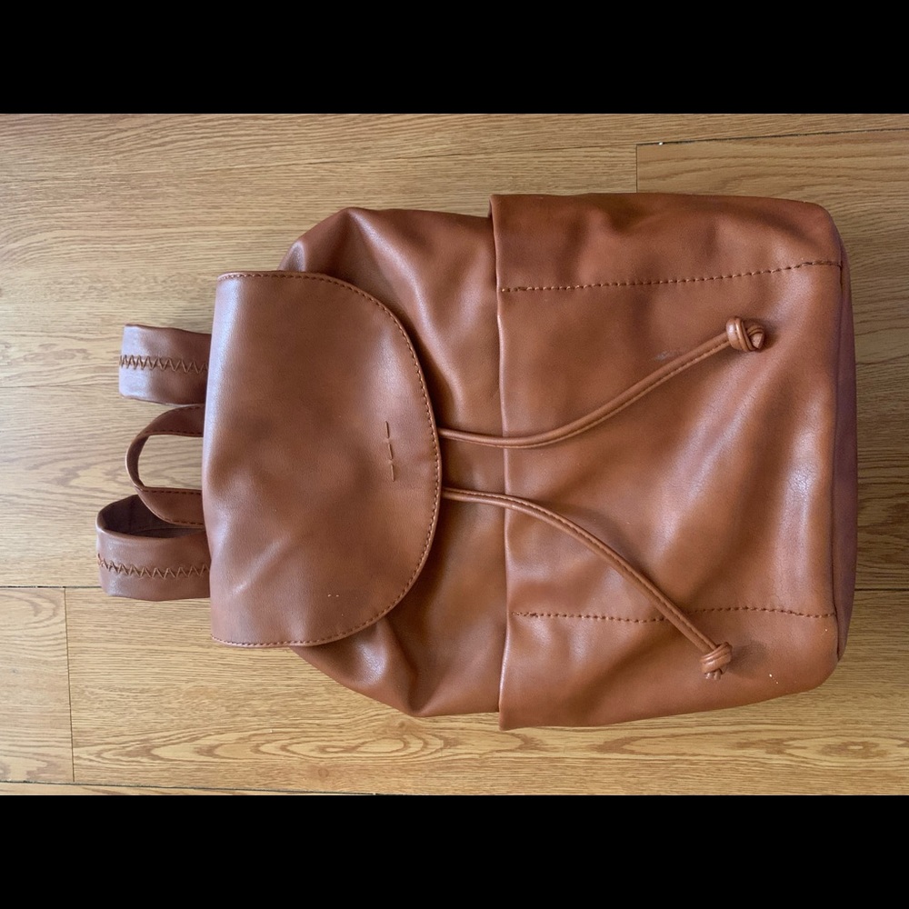 Brown cinch in Backpack